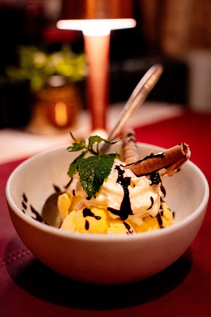 Gourmet desserts with ice cream, parfait, berries and mint